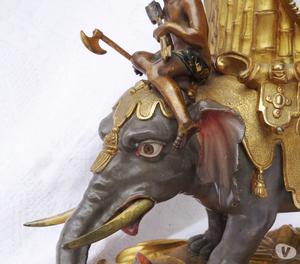 Orologio di bronzo dorato anticato Jacquier con elefante