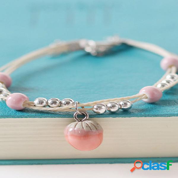 Bracciale con perle in ceramica intrecciate a mano etniche