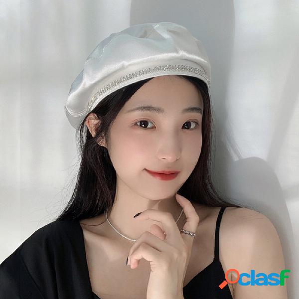 Cappello da donna in cotone tinta unita con decorazione di