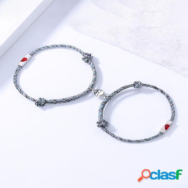 Set di 2 bracciali per coppia a forma di cuore regolabili