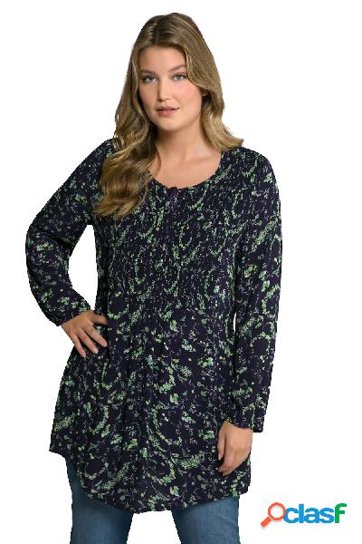 Tunica dal taglio svasato con fiori, inserto a punto smock,