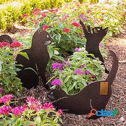 ferro tre che giocano gatti neri arte del giardino - gatti 3