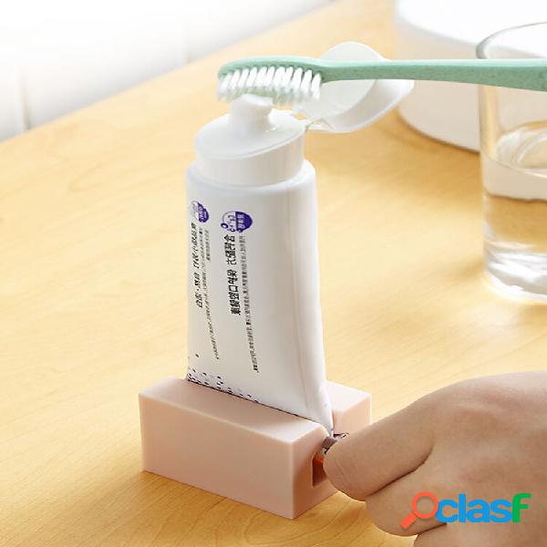 Dispenser di dentifricio Tubo di crema Spremiagrumi Supporto