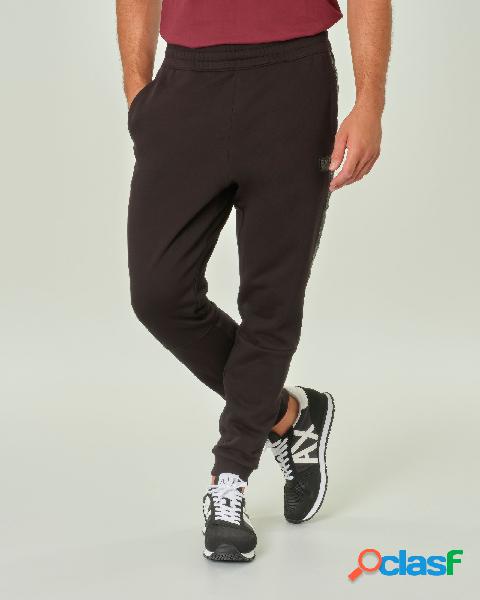 Pantaloni neri in felpa di cotone con bande laterali