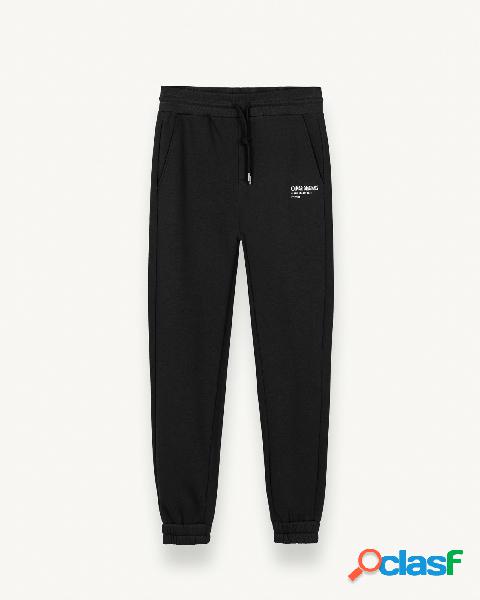 Pantaloni neri oversize in felpa di cotone con stampa logo