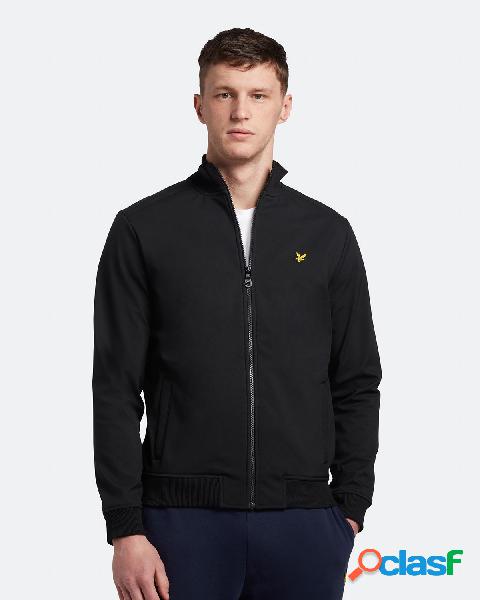 Giubbino nero leggero in Soft Shell con interno in pile