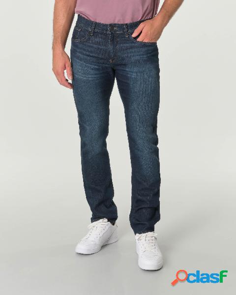 Jeans J13 lavaggio scuro stone washed con baffature