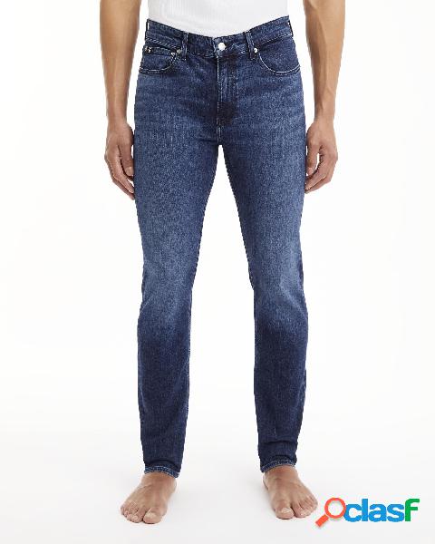 Jeans slim tapered lavaggio medio stone washed