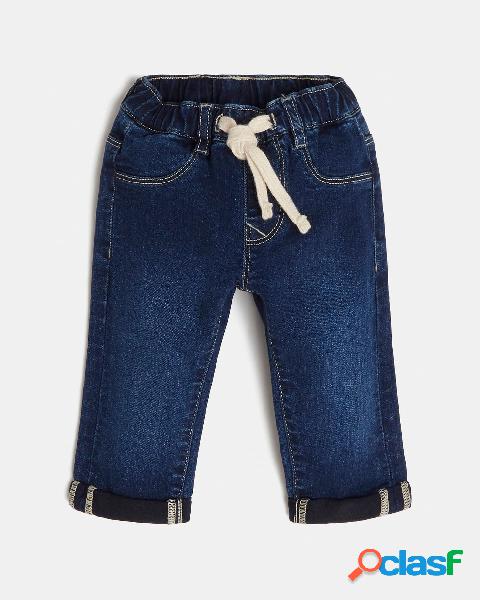 Jeans blu denim con fascia elastica in vita e coulisse 9-24