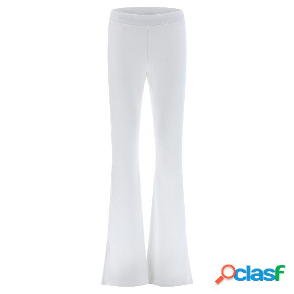 Pantaloni aderenti con vita alta e fondo flare con spacchi