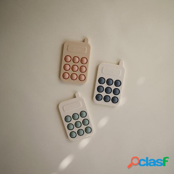 Gioco Mushie Phone Press - Vari Colori