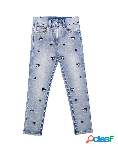Jeans lavaggio chiaro stone washed con logo eyestar all over