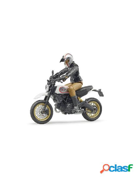 Moto ducati scrambler desert sled con pilota