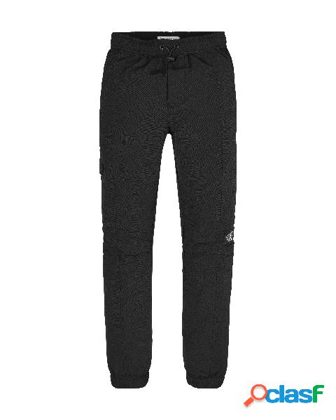 Pantalone nero in tessuto tecnico con coulisse e polsini